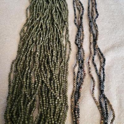 22 STRAND NECKLACE OF GREEN JASPER AND 4 STRAND NECKLACE OF MULTI COLOR BEADS