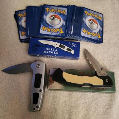 STACK OF NEWER POKEMON CARDS AND 2 NEW POCKET KNIVES