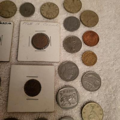 35 FOREIGN COINS