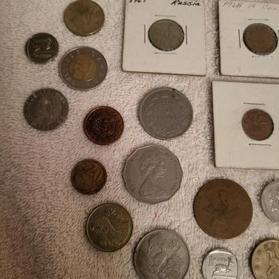 35 FOREIGN COINS