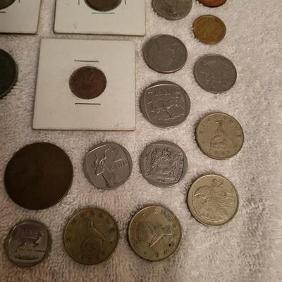 35 FOREIGN COINS