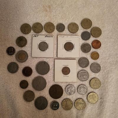 35 FOREIGN COINS