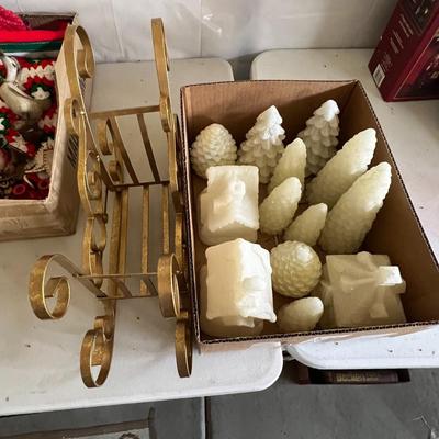 Box of Christmas decor and sleigh