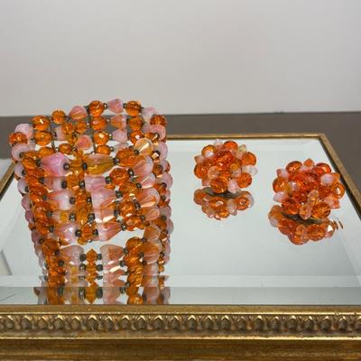 Signed faceted glass beaded bracelet and earrings