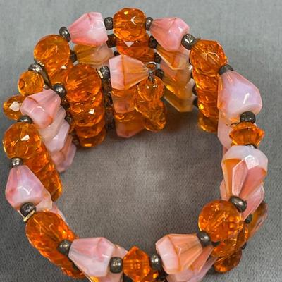 Signed faceted glass beaded bracelet and earrings