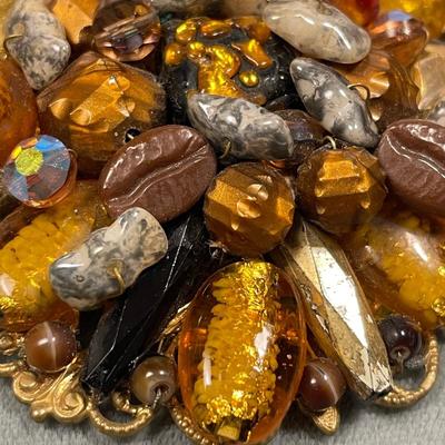 Unusual art and foil glass beaded pin