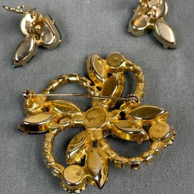 Green rhinestone pin and earrings