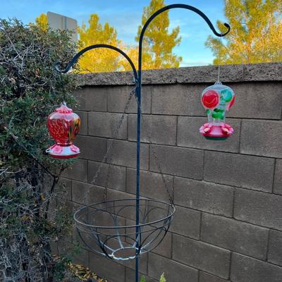 Hummingbird feeders and stand