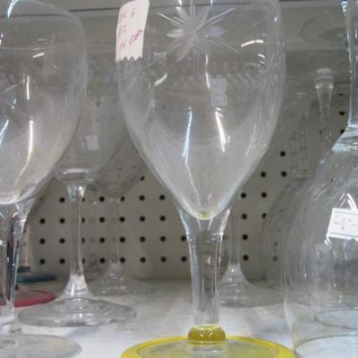 Assortment Of Clear Glass Drinking Glasses Some Etched