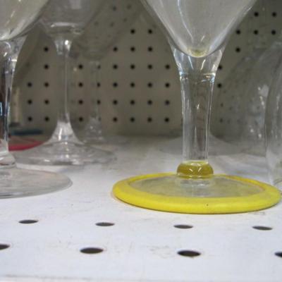 Assortment Of Clear Glass Drinking Glasses Some Etched