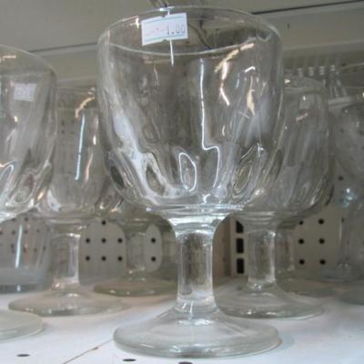 Assortment Of Clear Glass Drinking Glasses Some Etched