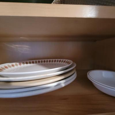 Lot of serving platters, plates, bowls everything pictured