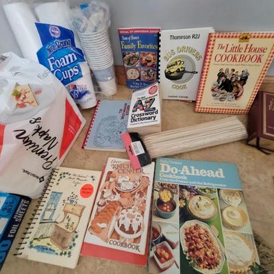 Lot of cookbooks and kitchen/camping items