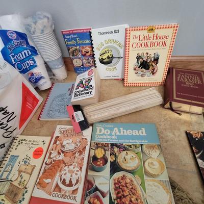 Lot of cookbooks and kitchen/camping items