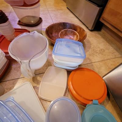 Lot of containers and measuring bowls and wooden bols serving bowl
