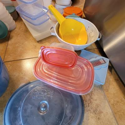 Lot of containers and measuring bowls and wooden bols serving bowl