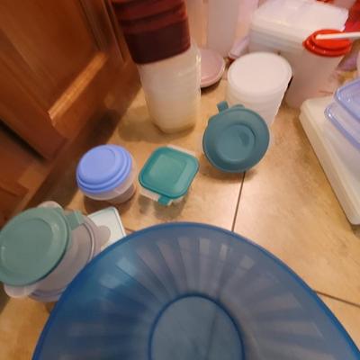 Lot of containers and measuring bowls and wooden bols serving bowl