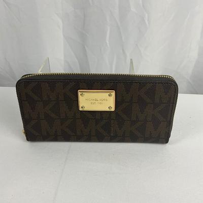 Lot E 250 Michael Kors Zip Up Wallet and London Fog Leather Ruck Sack