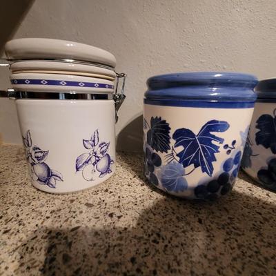 Lot of 3 hand painted ceramic canisters