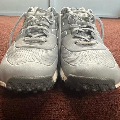 Pair of Adidas, Ecco and New Balance Shoes