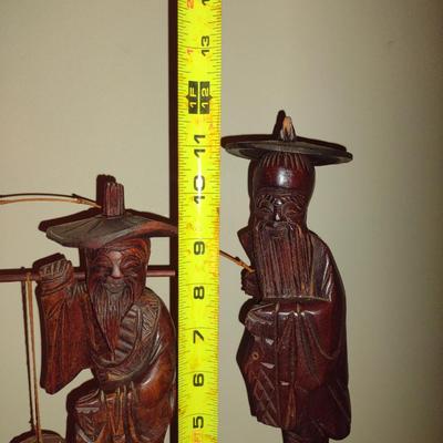 Pair of Carved Wooden Asian Figurines