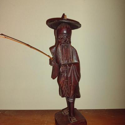 Pair of Carved Wooden Asian Figurines