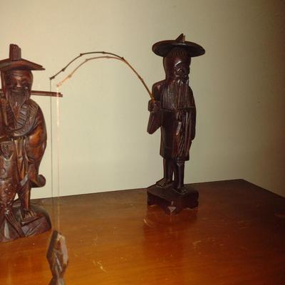 Pair of Carved Wooden Asian Figurines