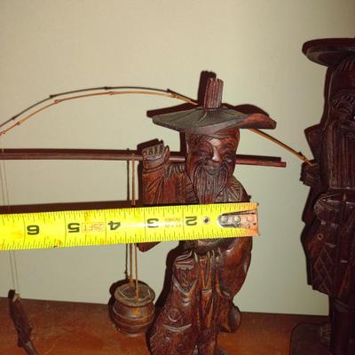 Pair of Carved Wooden Asian Figurines