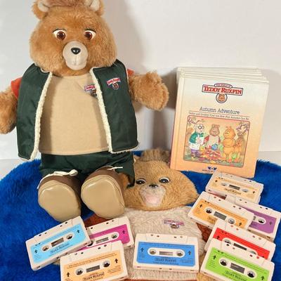 LOT 56: Teddy Ruxpin Collection - Speaking Teddy Bear, Books, Cassette Tapes and Pillow Cover