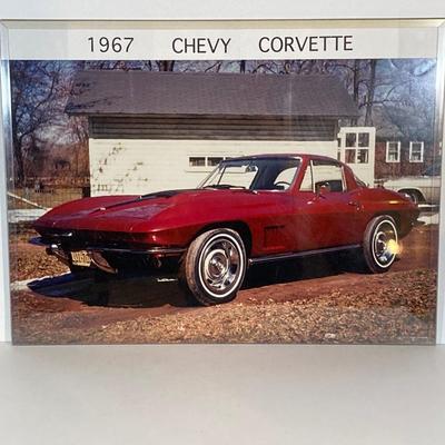 LOT 57: Chevy Corvette Collection - Large Photograph, Tin Signs, 1967 Ertl Collectible American Muscle Sting Ray Diecast, Chronical Book...