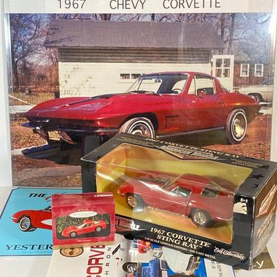 LOT 57: Chevy Corvette Collection - Large Photograph, Tin Signs, 1967 Ertl Collectible American Muscle Sting Ray Diecast, Chronical Book...