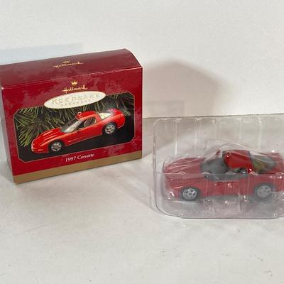 LOT 57: Chevy Corvette Collection - Large Photograph, Tin Signs, 1967 Ertl Collectible American Muscle Sting Ray Diecast, Chronical Book...