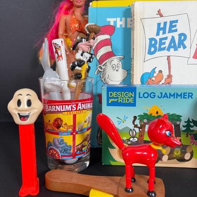 LOT 90: Dr. Suess Books, Wind-up Walking Toys. Simpsons Pez Dispensers, Fisher Price Medical Kit & More