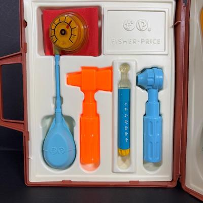 LOT 90: Dr. Suess Books, Wind-up Walking Toys. Simpsons Pez Dispensers, Fisher Price Medical Kit & More