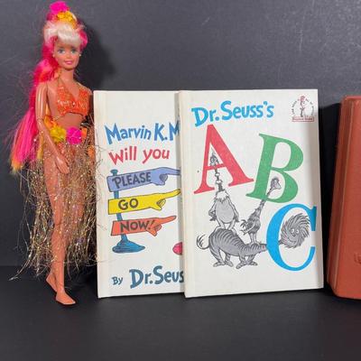 LOT 90: Dr. Suess Books, Wind-up Walking Toys. Simpsons Pez Dispensers, Fisher Price Medical Kit & More