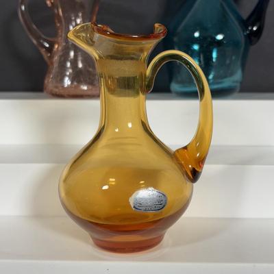 LOT 105: Vintage Rainbow Art Glass Pitchers, Viking Glass Candle Holders, Crackle Glass Pitchers