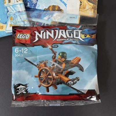 LOT 106: Vintage Star Wars Twin Sheet Set, Unopened Mini Star Wars Poe's X-Wing Fighter Legos, Star Wars Pez Dispenser &...