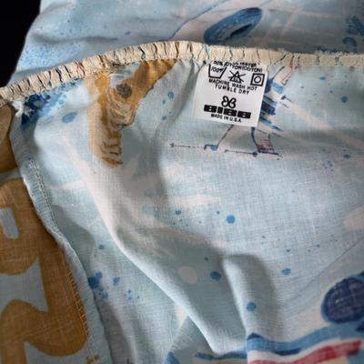 LOT 106: Vintage Star Wars Twin Sheet Set, Unopened Mini Star Wars Poe's X-Wing Fighter Legos, Star Wars Pez Dispenser &...