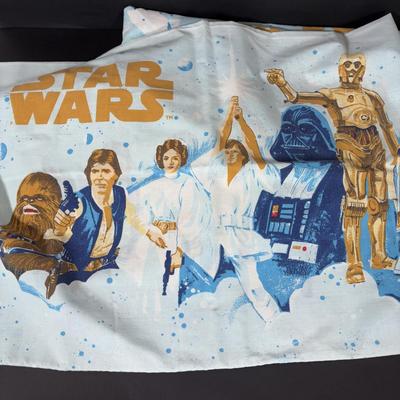LOT 106: Vintage Star Wars Twin Sheet Set, Unopened Mini Star Wars Poe's X-Wing Fighter Legos, Star Wars Pez Dispenser &...
