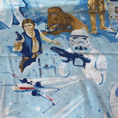 LOT 106: Vintage Star Wars Twin Sheet Set, Unopened Mini Star Wars Poe's X-Wing Fighter Legos, Star Wars Pez Dispenser &...