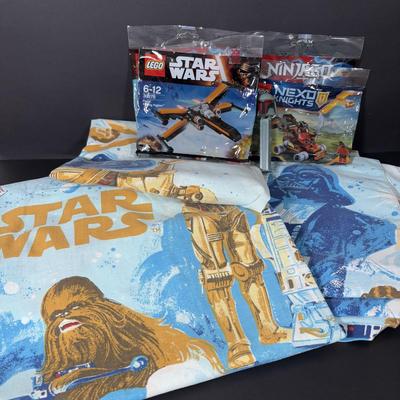 LOT 106: Vintage Star Wars Twin Sheet Set, Unopened Mini Star Wars Poe's X-Wing Fighter Legos, Star Wars Pez Dispenser &...