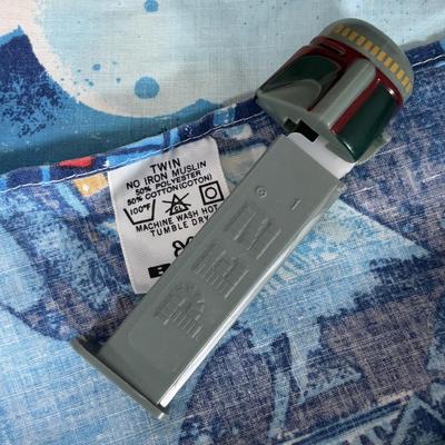 LOT 106: Vintage Star Wars Twin Sheet Set, Unopened Mini Star Wars Poe's X-Wing Fighter Legos, Star Wars Pez Dispenser &...