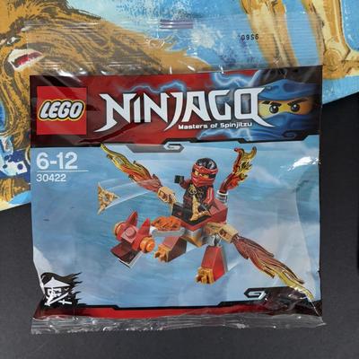 LOT 106: Vintage Star Wars Twin Sheet Set, Unopened Mini Star Wars Poe's X-Wing Fighter Legos, Star Wars Pez Dispenser &...