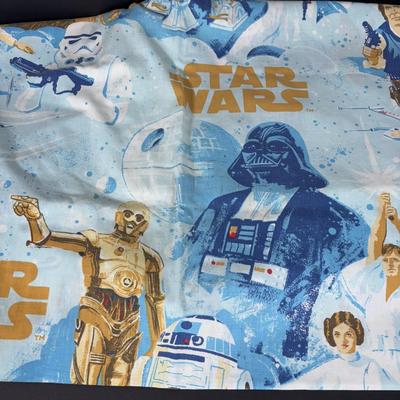 LOT 106: Vintage Star Wars Twin Sheet Set, Unopened Mini Star Wars Poe's X-Wing Fighter Legos, Star Wars Pez Dispenser &...