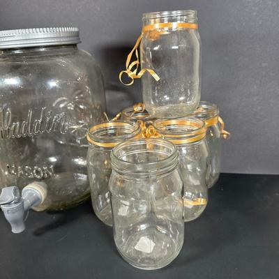 LOT 115: Frosted Prisma Glasses, Land O Lakes Mug, Mason Jars & More