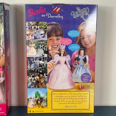 LOT 148: The Wizard Of Oz Dorthy & Glinda Barbie In Packaging