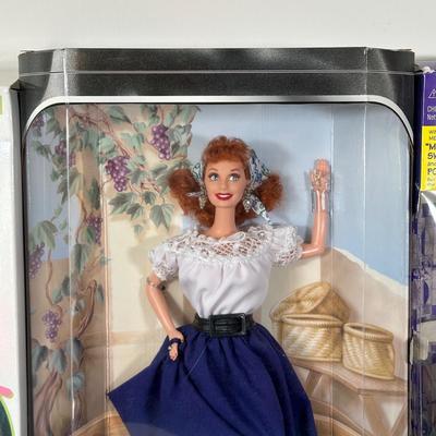 LOT 150: I Love Lucy, Sabrina The Teenage Witch, Vanna White Dolls in Package
