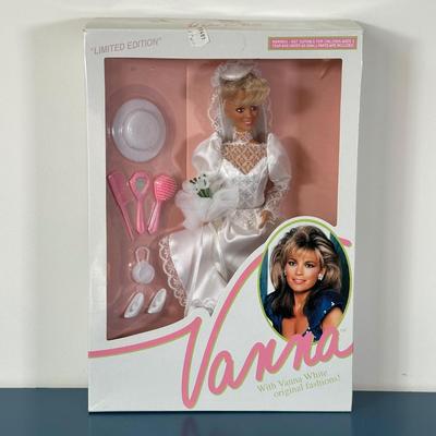 LOT 150: I Love Lucy, Sabrina The Teenage Witch, Vanna White Dolls in Package