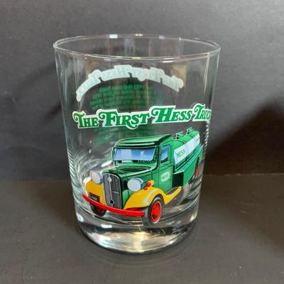 LOT:164: Collection of 3 Hess Trucks and a Collectable Hess Truck Glass - Featuring the Hess First Truck