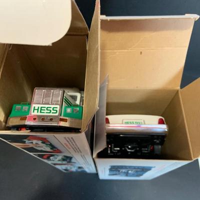 LOT:165: Assortment of 5 Hess Toy Trucks - 1989 Truck and Racer, 1989 Fire Truck. 1991 Truck and Racer, 1992 18 Wheeler and 1993 Patrol Car